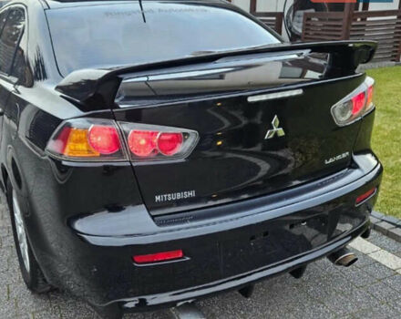 Черный Мицубиси Лансер, объемом двигателя 1.59 л и пробегом 220 тыс. км за 9800 $, фото 4 на Automoto.ua