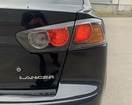 Чорний Міцубісі Lancer, об'ємом двигуна 1.6 л та пробігом 177 тис. км за 7300 $, фото 13 на Automoto.ua