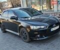 Черный Мицубиси Лансер, объемом двигателя 1.59 л и пробегом 250 тыс. км за 7900 $, фото 1 на Automoto.ua