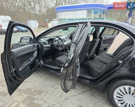 Чорний Міцубісі Lancer, об'ємом двигуна 1.5 л та пробігом 223 тис. км за 5500 $, фото 24 на Automoto.ua
