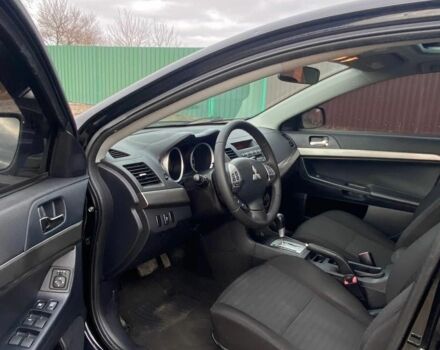 Чорний Міцубісі Lancer, об'ємом двигуна 2 л та пробігом 50 тис. км за 8300 $, фото 3 на Automoto.ua