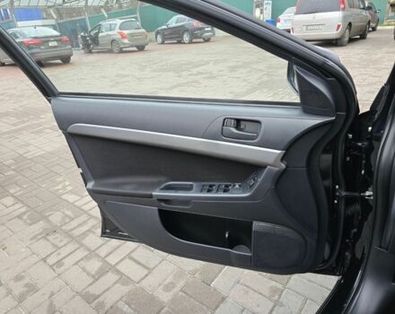 Черный Мицубиси Лансер, объемом двигателя 2 л и пробегом 223 тыс. км за 5500 $, фото 15 на Automoto.ua