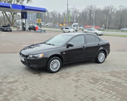 Черный Мицубиси Лансер, объемом двигателя 2 л и пробегом 223 тыс. км за 5500 $, фото 2 на Automoto.ua