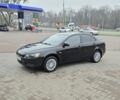 Черный Мицубиси Лансер, объемом двигателя 2 л и пробегом 223 тыс. км за 5500 $, фото 2 на Automoto.ua