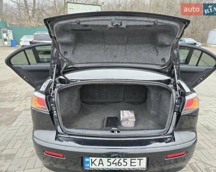 Чорний Міцубісі Lancer, об'ємом двигуна 1.5 л та пробігом 223 тис. км за 5500 $, фото 25 на Automoto.ua