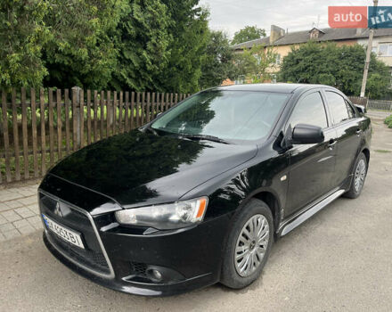 Черный Мицубиси Лансер, объемом двигателя 1.8 л и пробегом 224 тыс. км за 7300 $, фото 1 на Automoto.ua