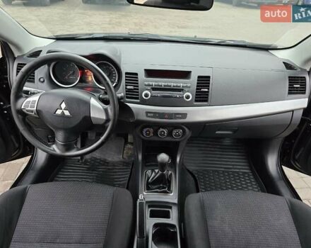 Чорний Міцубісі Lancer, об'ємом двигуна 1.5 л та пробігом 223 тис. км за 5500 $, фото 15 на Automoto.ua