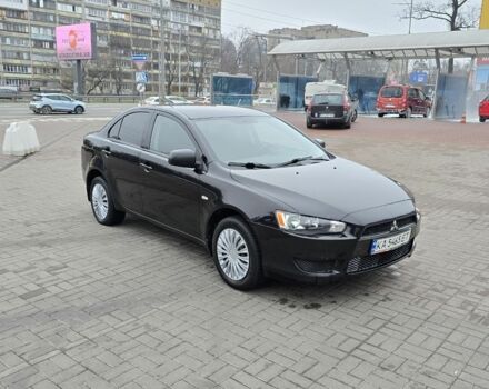 Черный Мицубиси Лансер, объемом двигателя 2 л и пробегом 223 тыс. км за 5500 $, фото 6 на Automoto.ua