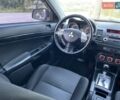Черный Мицубиси Лансер, объемом двигателя 1.59 л и пробегом 146 тыс. км за 8450 $, фото 85 на Automoto.ua