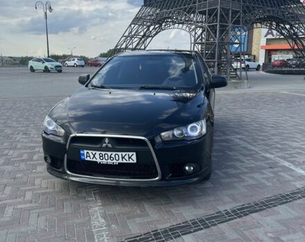 Чорний Міцубісі Lancer, об'ємом двигуна 1.6 л та пробігом 200 тис. км за 7500 $, фото 1 на Automoto.ua