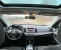 Чорний Міцубісі Lancer, об'ємом двигуна 2 л та пробігом 50 тис. км за 8300 $, фото 4 на Automoto.ua