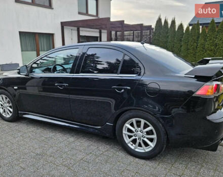 Черный Мицубиси Лансер, объемом двигателя 1.59 л и пробегом 220 тыс. км за 9800 $, фото 1 на Automoto.ua