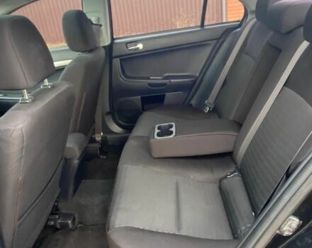 Чорний Міцубісі Lancer, об'ємом двигуна 2 л та пробігом 50 тис. км за 8300 $, фото 5 на Automoto.ua