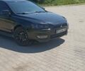 Черный Мицубиси Лансер, объемом двигателя 2 л и пробегом 170 тыс. км за 7500 $, фото 5 на Automoto.ua
