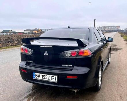 Чорний Міцубісі Lancer, об'ємом двигуна 2 л та пробігом 123 тис. км за 9000 $, фото 4 на Automoto.ua