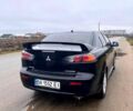 Чорний Міцубісі Lancer, об'ємом двигуна 2 л та пробігом 123 тис. км за 9000 $, фото 4 на Automoto.ua