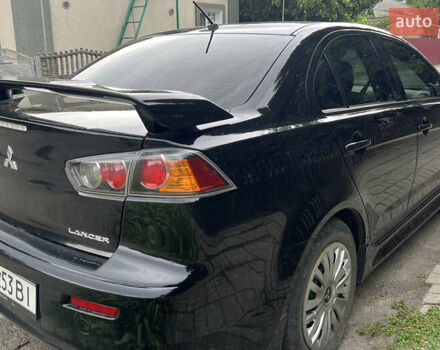 Черный Мицубиси Лансер, объемом двигателя 1.8 л и пробегом 224 тыс. км за 7300 $, фото 5 на Automoto.ua