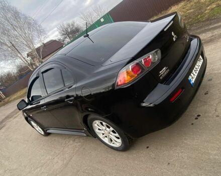 Чорний Міцубісі Lancer, об'ємом двигуна 2 л та пробігом 50 тис. км за 8300 $, фото 1 на Automoto.ua