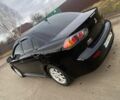 Чорний Міцубісі Lancer, об'ємом двигуна 2 л та пробігом 50 тис. км за 8300 $, фото 1 на Automoto.ua