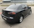 Чорний Міцубісі Lancer, об'ємом двигуна 1.6 л та пробігом 177 тис. км за 7300 $, фото 14 на Automoto.ua