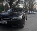 Черный Мицубиси Лансер, объемом двигателя 1.6 л и пробегом 224 тыс. км за 6000 $, фото 1 на Automoto.ua