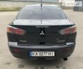 Чорний Міцубісі Lancer, об'ємом двигуна 1.6 л та пробігом 177 тис. км за 7300 $, фото 11 на Automoto.ua