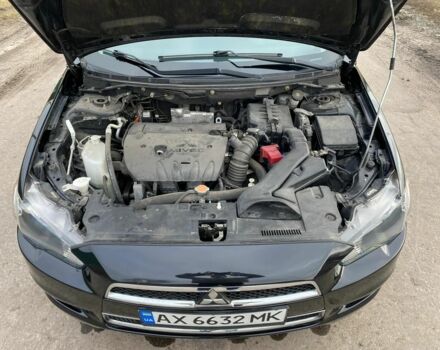 Чорний Міцубісі Lancer, об'ємом двигуна 2 л та пробігом 50 тис. км за 8300 $, фото 6 на Automoto.ua