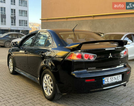 Черный Мицубиси Лансер, объемом двигателя 1.59 л и пробегом 186 тыс. км за 7300 $, фото 25 на Automoto.ua