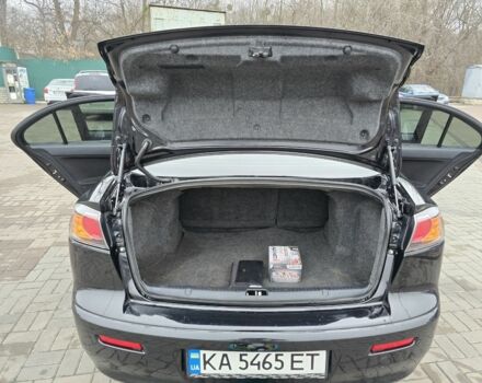 Черный Мицубиси Лансер, объемом двигателя 2 л и пробегом 223 тыс. км за 5500 $, фото 16 на Automoto.ua