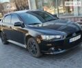 Чорний Міцубісі Lancer, об'ємом двигуна 1.59 л та пробігом 185 тис. км за 8499 $, фото 1 на Automoto.ua