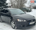 Чорний Міцубісі Lancer, об'ємом двигуна 1.59 л та пробігом 272 тис. км за 6500 $, фото 1 на Automoto.ua