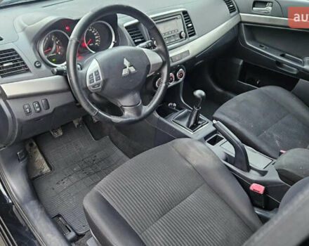 Черный Мицубиси Лансер, объемом двигателя 1.59 л и пробегом 220 тыс. км за 9800 $, фото 10 на Automoto.ua