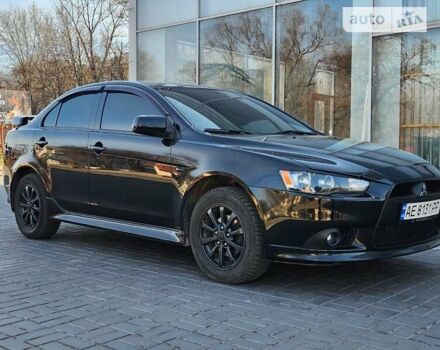 Чорний Міцубісі Lancer, об'ємом двигуна 1.59 л та пробігом 185 тис. км за 8499 $, фото 2 на Automoto.ua