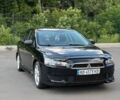 Черный Мицубиси Лансер, объемом двигателя 2 л и пробегом 192 тыс. км за 7800 $, фото 1 на Automoto.ua
