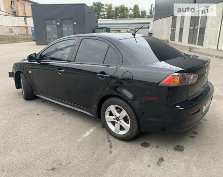 Чорний Міцубісі Lancer, об'ємом двигуна 1.6 л та пробігом 177 тис. км за 7300 $, фото 10 на Automoto.ua