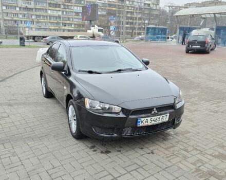 Черный Мицубиси Лансер, объемом двигателя 2 л и пробегом 223 тыс. км за 5500 $, фото 7 на Automoto.ua