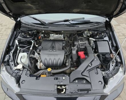 Черный Мицубиси Лансер, объемом двигателя 2 л и пробегом 223 тыс. км за 5500 $, фото 18 на Automoto.ua