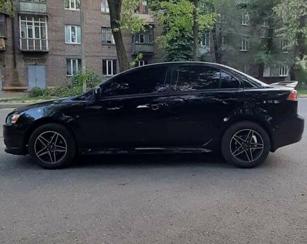 Чорний Міцубісі Lancer, об'ємом двигуна 1.6 л та пробігом 121 тис. км за 8999 $, фото 3 на Automoto.ua