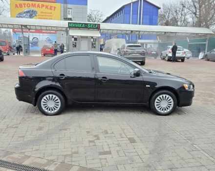 Черный Мицубиси Лансер, объемом двигателя 2 л и пробегом 223 тыс. км за 5500 $, фото 5 на Automoto.ua