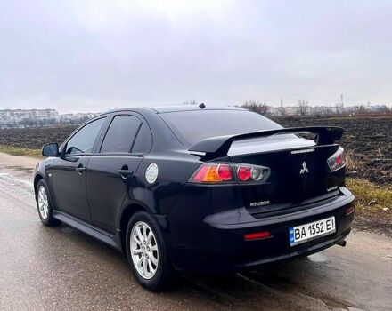 Чорний Міцубісі Lancer, об'ємом двигуна 2 л та пробігом 123 тис. км за 9000 $, фото 2 на Automoto.ua