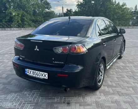 Чорний Міцубісі Lancer, об'ємом двигуна 1.6 л та пробігом 200 тис. км за 7500 $, фото 6 на Automoto.ua