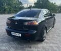 Чорний Міцубісі Lancer, об'ємом двигуна 1.6 л та пробігом 200 тис. км за 7500 $, фото 6 на Automoto.ua