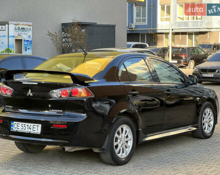Черный Мицубиси Лансер, объемом двигателя 1.59 л и пробегом 186 тыс. км за 7300 $, фото 4 на Automoto.ua
