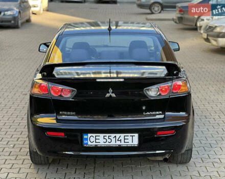 Черный Мицубиси Лансер, объемом двигателя 1.59 л и пробегом 186 тыс. км за 7300 $, фото 5 на Automoto.ua