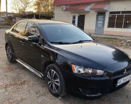 Черный Мицубиси Лансер, объемом двигателя 2 л и пробегом 175 тыс. км за 9200 $, фото 14 на Automoto.ua