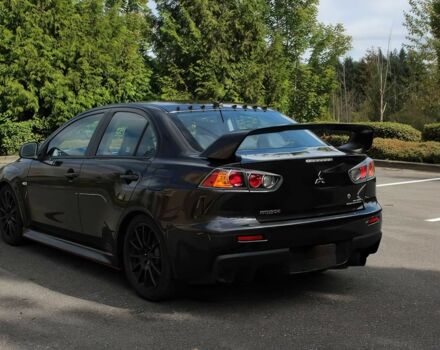 Чорний Міцубісі Lancer, об'ємом двигуна 2 л та пробігом 82 тис. км за 11000 $, фото 6 на Automoto.ua