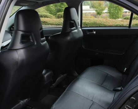 Чорний Міцубісі Lancer, об'ємом двигуна 2 л та пробігом 85 тис. км за 6500 $, фото 13 на Automoto.ua