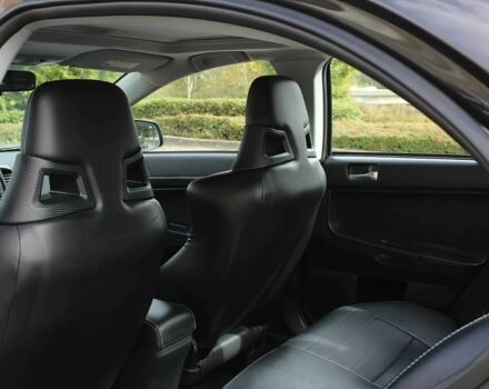 Чорний Міцубісі Lancer, об'ємом двигуна 2 л та пробігом 85 тис. км за 6500 $, фото 12 на Automoto.ua
