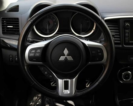Чорний Міцубісі Lancer, об'ємом двигуна 2 л та пробігом 82 тис. км за 11000 $, фото 9 на Automoto.ua