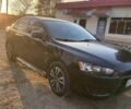Черный Мицубиси Лансер, объемом двигателя 2 л и пробегом 175 тыс. км за 9200 $, фото 2 на Automoto.ua